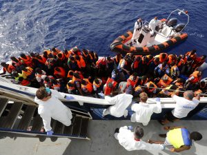 migrants refugees crisis europe tough immigration policy outer borders frontex NGO italy